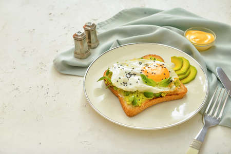 Plate with tasty sandwich on white backgroundの写真素材