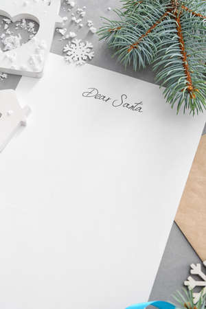 Letter to Santa and Christmas decor on gray backgroundの写真素材