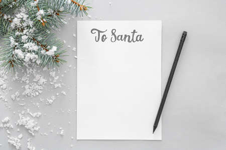 Letter to Santa and Christmas decor on gray background