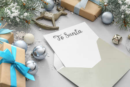Letter to Santa and Christmas decor on gray backgroundの写真素材