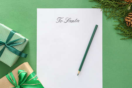 Letter to Santa and Christmas decor on color background