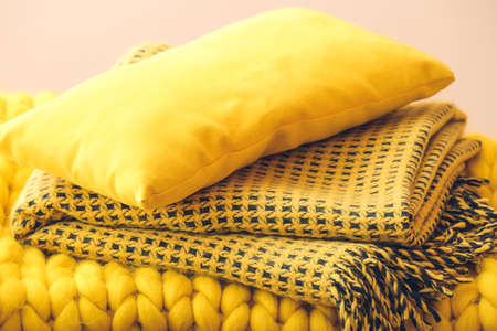 Warm plaids and pillow closeupの写真素材