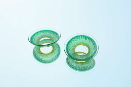 Contact lenses on color backgroundの写真素材