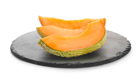 Board with sweet cut melon on white background