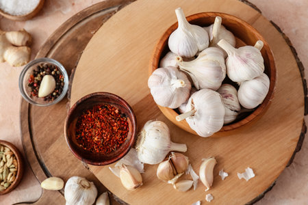 Bowl with fresh garlic on tableの写真素材