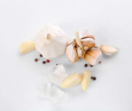 Fresh garlic with spices on white backgroundの写真素材