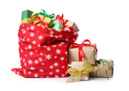 Santa Claus bag full of gifts on white background