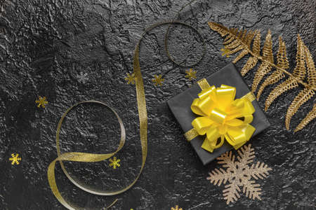 Beautiful Christmas decor and gift box on dark backgroundの写真素材
