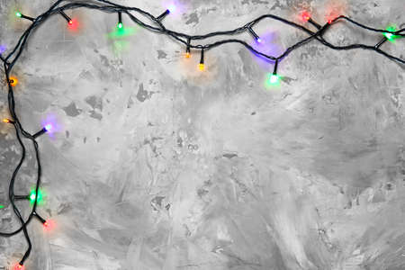 Christmas lights on gray backgroundの写真素材