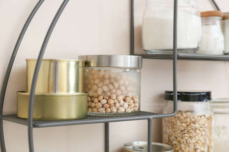 Different products on shelves in kitchenの写真素材