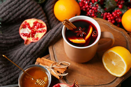 Cup of tasty mulled wine on tableの写真素材