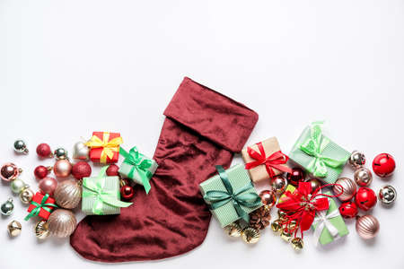 Composition with Christmas sock on white backgroundの写真素材