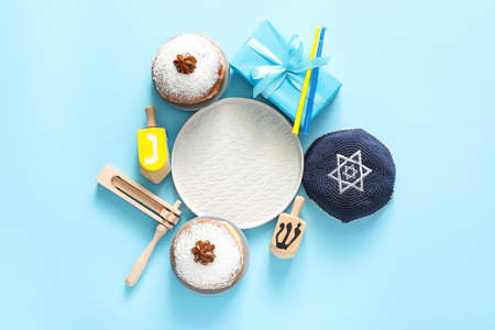 Composition for Hanukkah celebration on color background