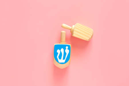 Dreidels for Hanukkah on color backgroundの写真素材