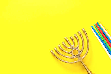 Menorah for Hanukkah on color backgroundの写真素材