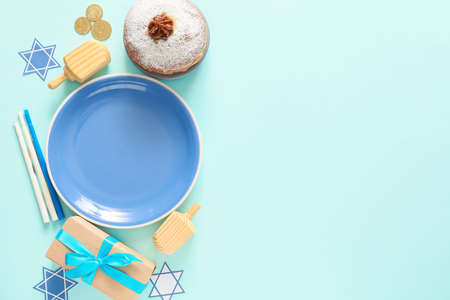 Composition for Hanukkah celebration on color backgroundの写真素材