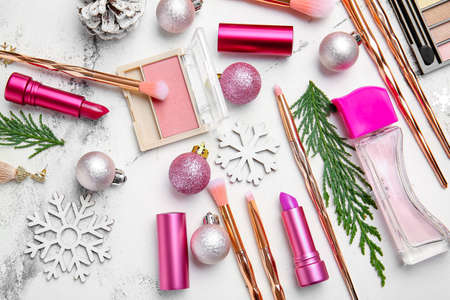 Christmas composition with cosmetics on light backgroundの写真素材