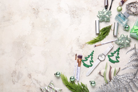 Christmas composition with cosmetics on light backgroundの写真素材