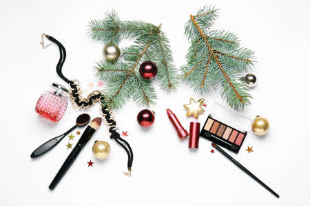 Christmas composition with cosmetics on white backgroundの写真素材