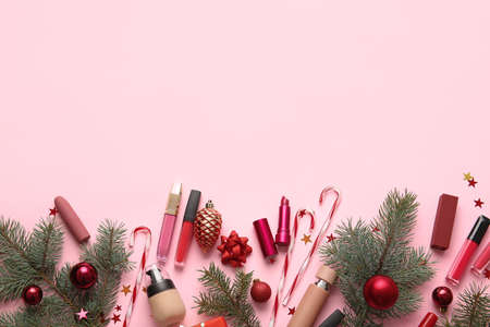 Christmas composition with cosmetics on color backgroundの写真素材
