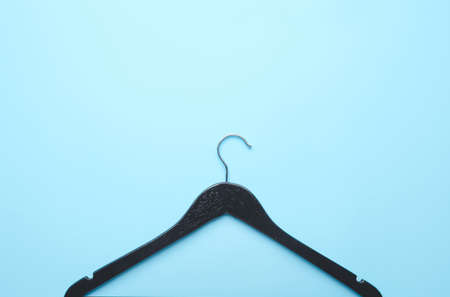 Clothes hanger on color backgroundの写真素材