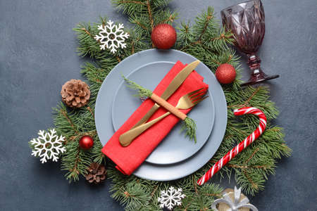 Christmas table setting on dark background