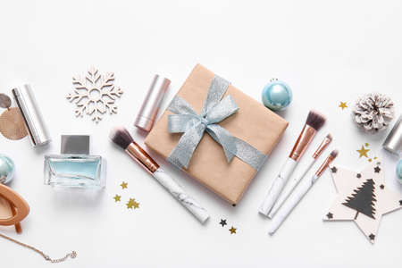 New Year composition with makeup cosmetics on white backgroundの写真素材