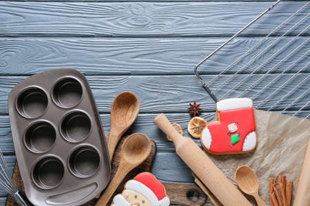 Kitchen utensils for Christmas bakery on gray wooden backgroundの写真素材