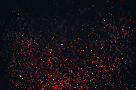 Dark abstract background with glittersの写真素材