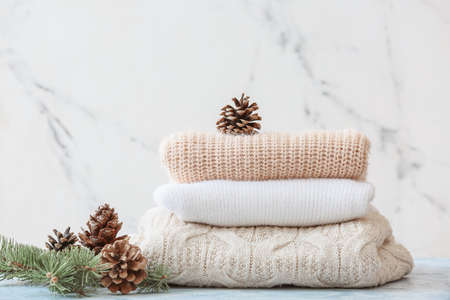 Stylish Christmas clothes on table