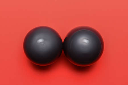 Air balloons on color background. Erotic and female health care concept