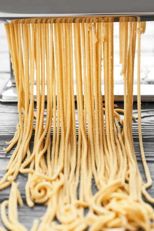 Pasta maker with dough, closeupの写真素材