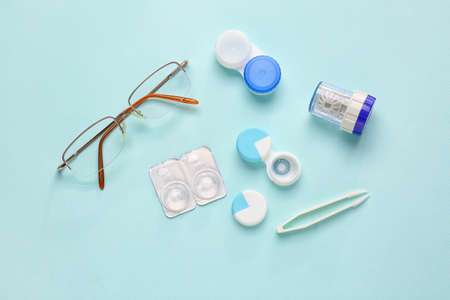 Composition with contact lenses and accessories on color backgroundの写真素材