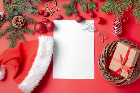 Blank paper for letter to Santa and Christmas decor on color backgroundの写真素材