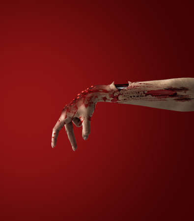 Monster's hand covered with blood on color background. Halloween celebrationの写真素材