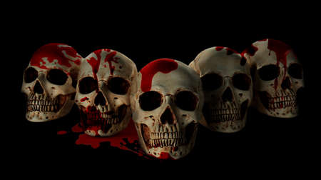 Human skulls covered with blood on black backgroundの写真素材