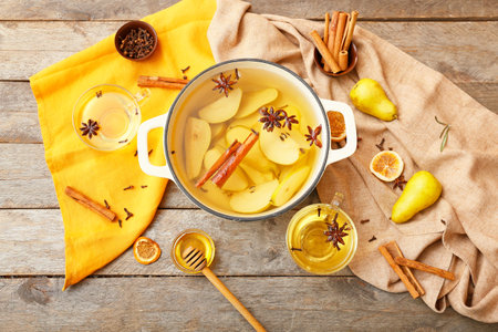 Hot mulled wine on wooden backgroundの写真素材