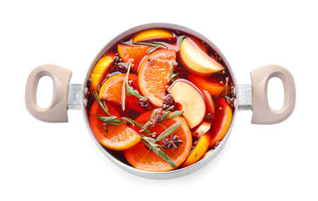 Saucepan with hot mulled wine on white backgroundの写真素材