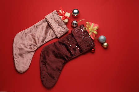Composition with Christmas socks on color backgroundの写真素材