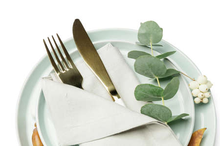 Beautiful table setting with autumn decor on white background