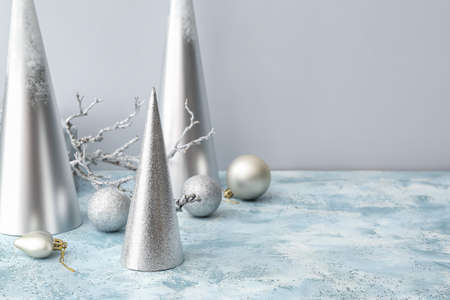 Beautiful Christmas decorations on table in roomの写真素材
