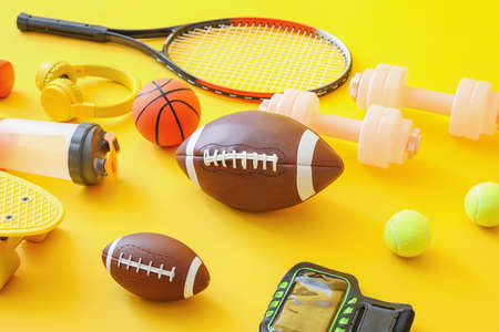Set of sport equipment on color backgroundの写真素材