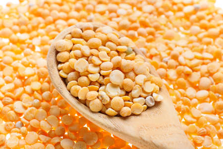 Spoon with split peas, closeup
