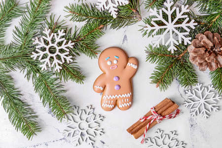 Christmas composition with gingerbread cookie on white backgroundの写真素材