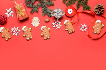 Christmas composition with gingerbread cookies on color backgroundの写真素材