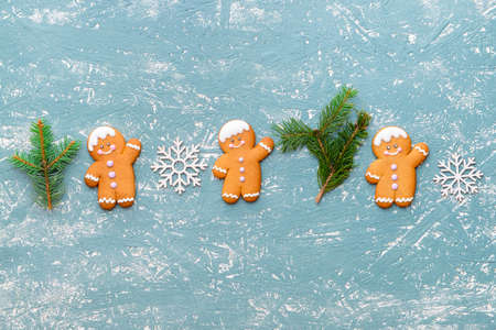 Christmas composition with gingerbread cookies on color backgroundの写真素材
