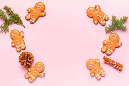 Christmas composition with gingerbread cookies on color backgroundの写真素材