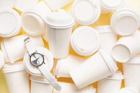 Wrist watch with coffee cups, top viewの写真素材