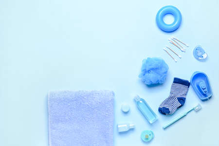 Set of bath accessories for baby on color background