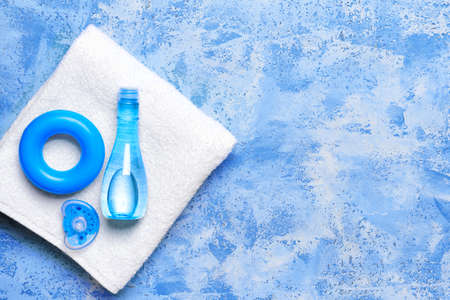Set of bath accessories for baby on color backgroundの写真素材